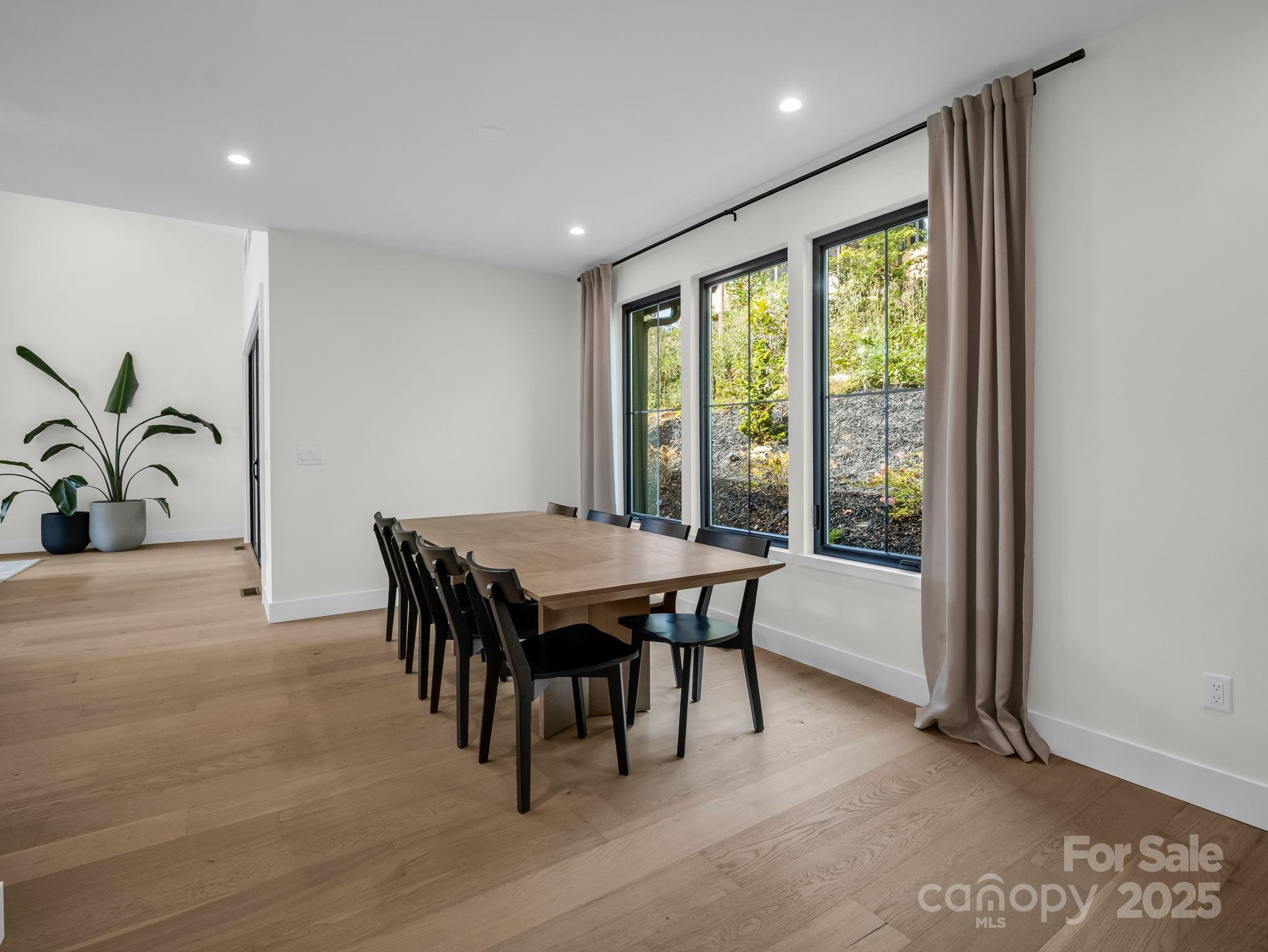 123 Millbrae Loop Hendersonville, NC 28791 - Photo 24 of 48 a dining room with furniture and window