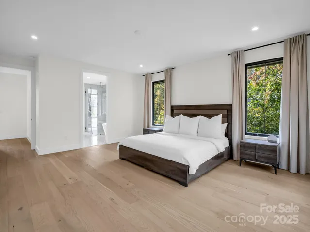 a bathroom with a double vanity sink and mirror