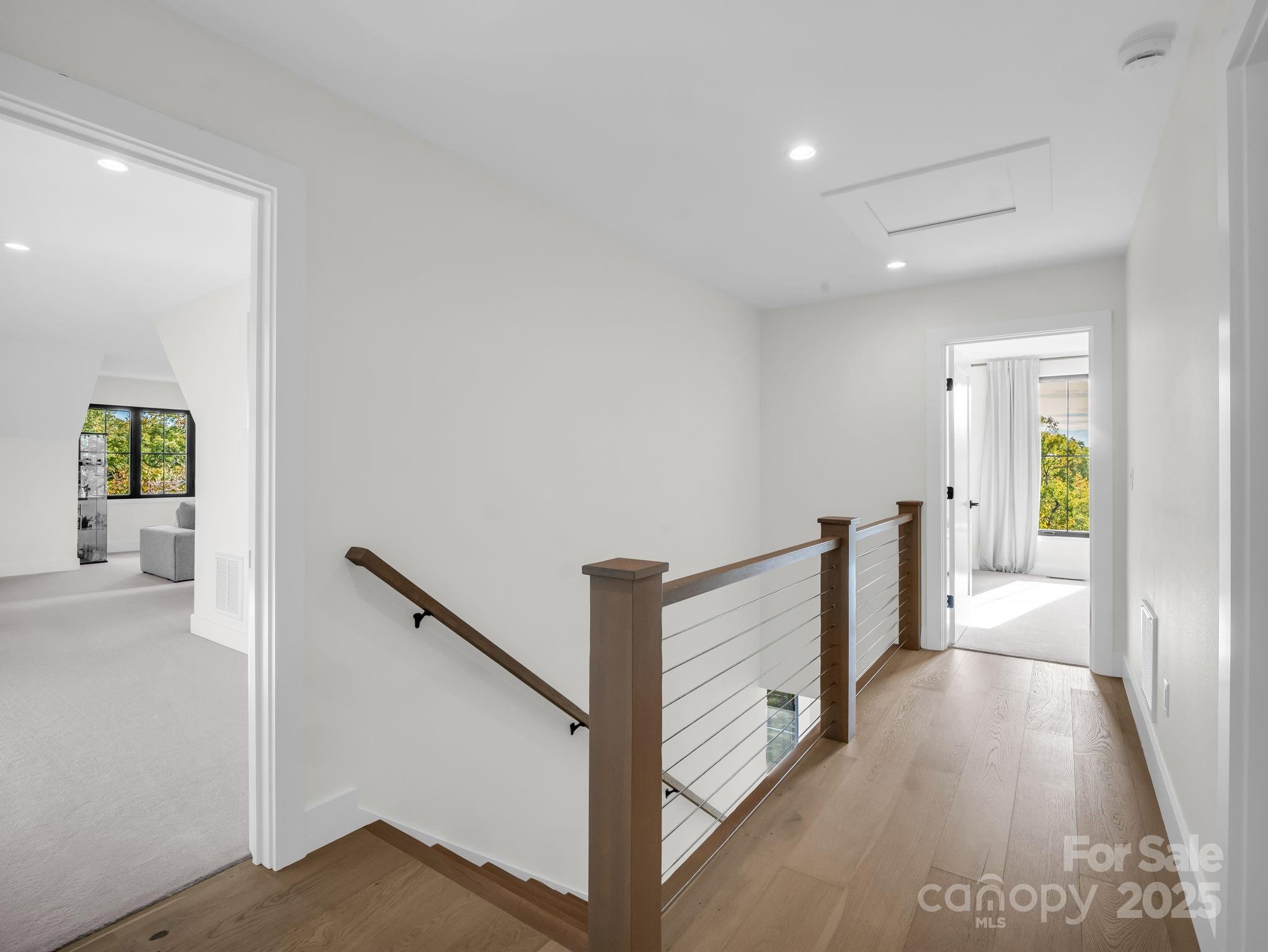 123 Millbrae Loop Hendersonville, NC 28791 - Photo 33 of 48 a view of hallway with wooden floor