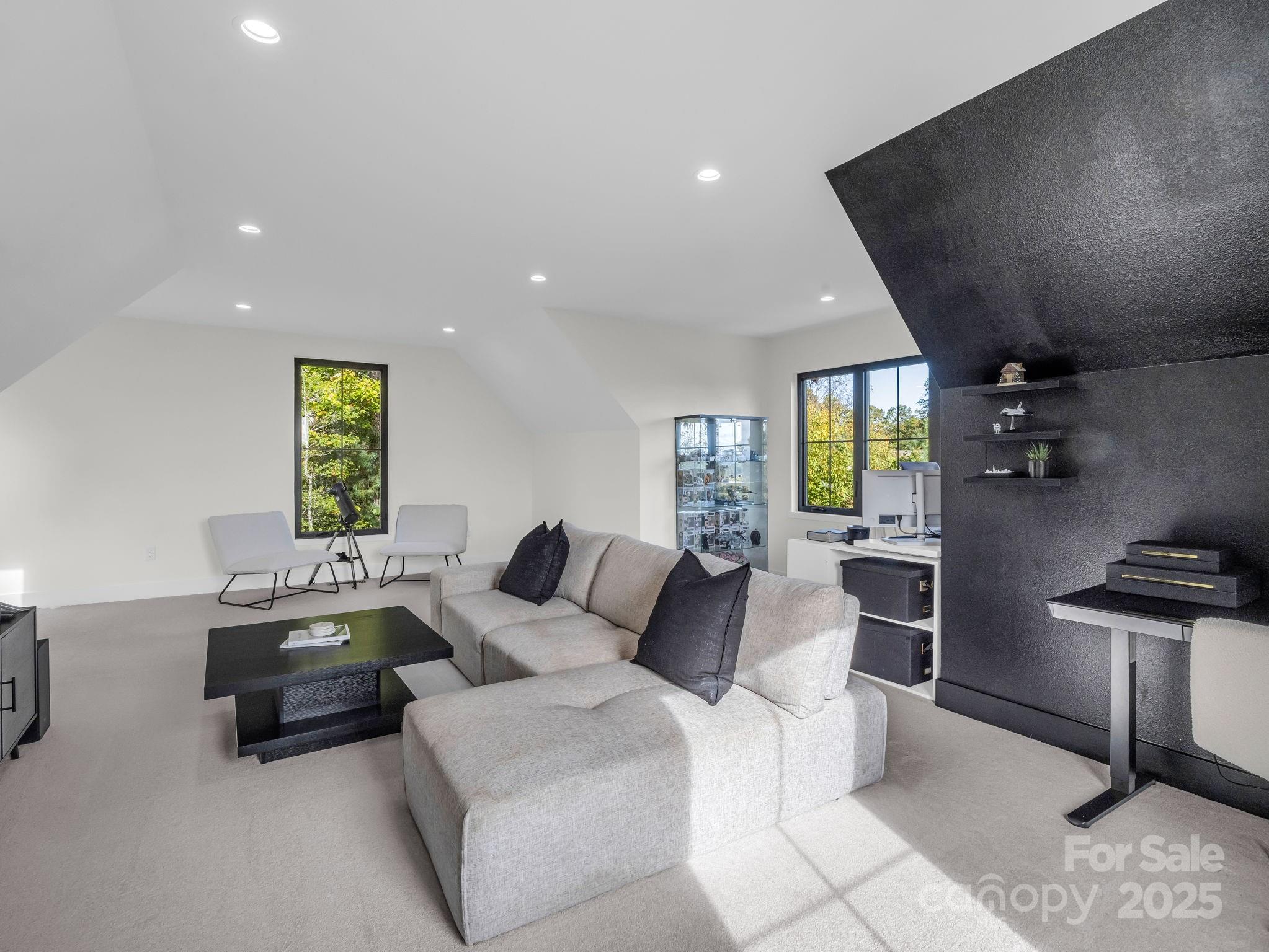 123 Millbrae Loop Hendersonville, NC 28791 - Photo 38 of 48 a living room with furniture and wooden floor