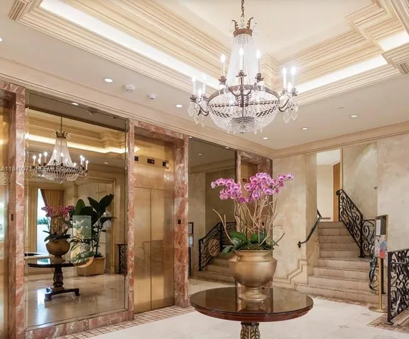 a swimming pool with outdoor seating and yard