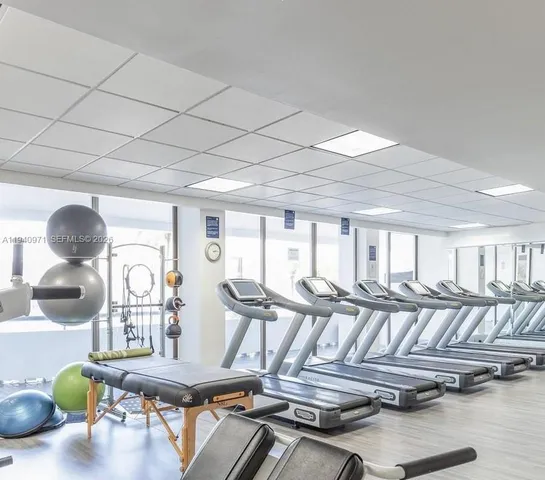 a view of a lake with a building in the background