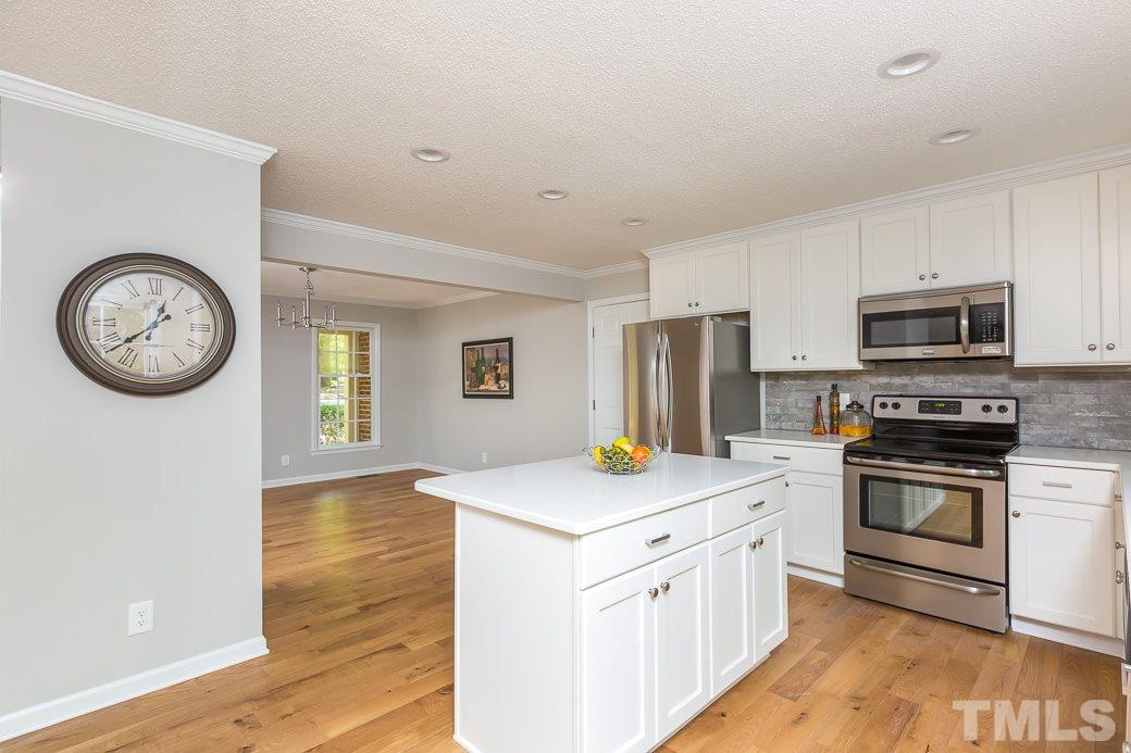 5508 Dutchman Drive Raleigh, NC 27606 - Photo 14 of 15 Another view of your NEW KITCHEN!! The bright open floor plan is perfect for entertaining and everything has been updated! There's plenty of closet and storage space too.