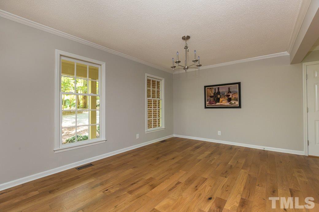 These gorgeous WOOD floors extend throughout the main level and also the staircase - nothing to do except move in!