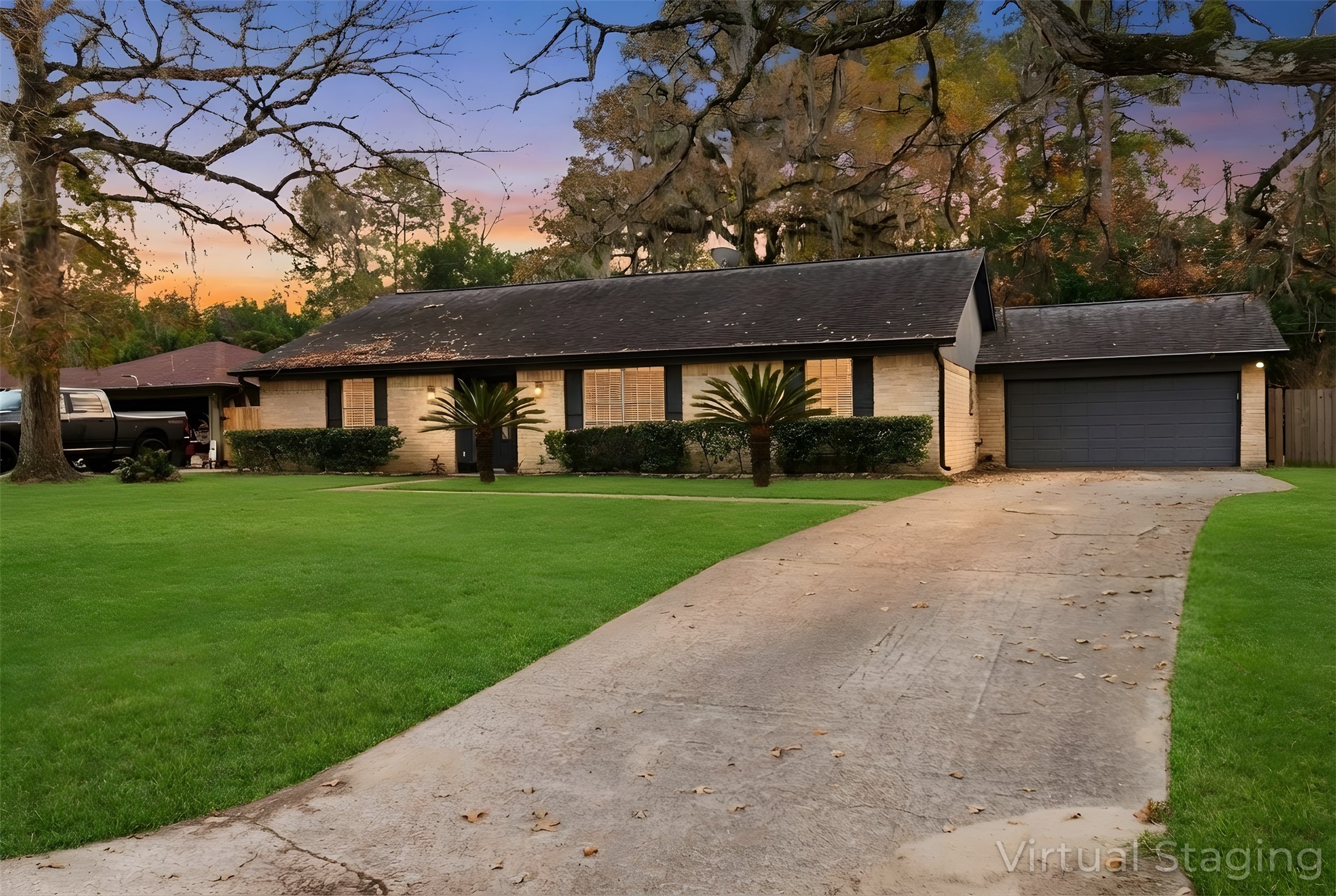 Long driveway supports a large parking area
