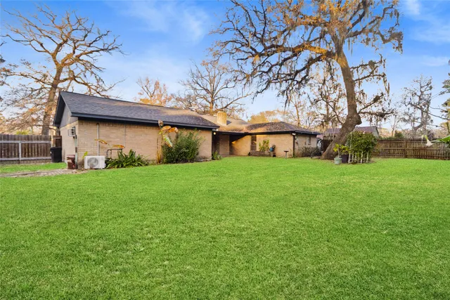 a front view of house with garden