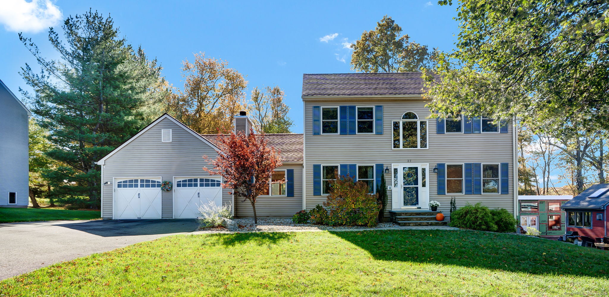 27 Valley Drive Middletown, CT 06457 - Photo 1 of 1 a front view of a house with a yard and garage