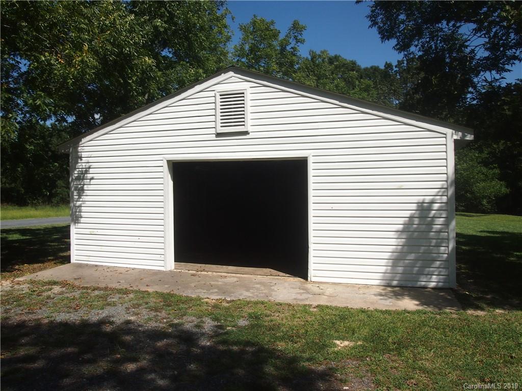 2603 High Ridge Church Road Marshville, NC 28103 - Photo 2 of 16 a front view of a house with a yard