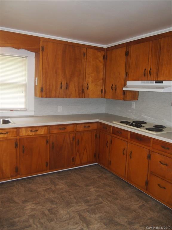 2603 High Ridge Church Road Marshville, NC 28103 - Photo 11 of 16 a kitchen with wooden cabinets