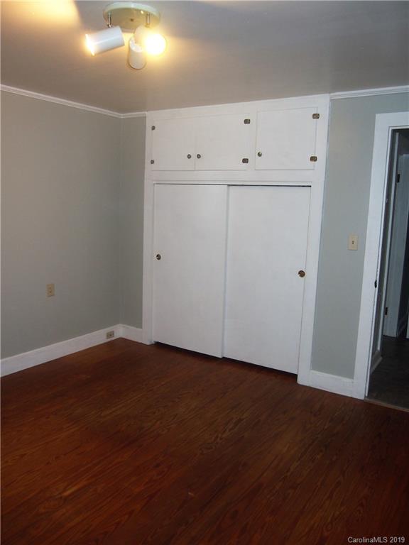 2603 High Ridge Church Road Marshville, NC 28103 - Photo 16 of 16 a view of an empty room with wooden floor