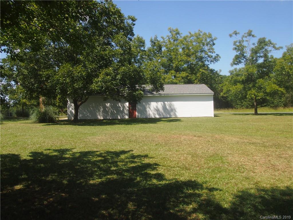 2603 High Ridge Church Road Marshville, NC 28103 - Photo 4 of 16 a view of an outdoor space and swimming pool