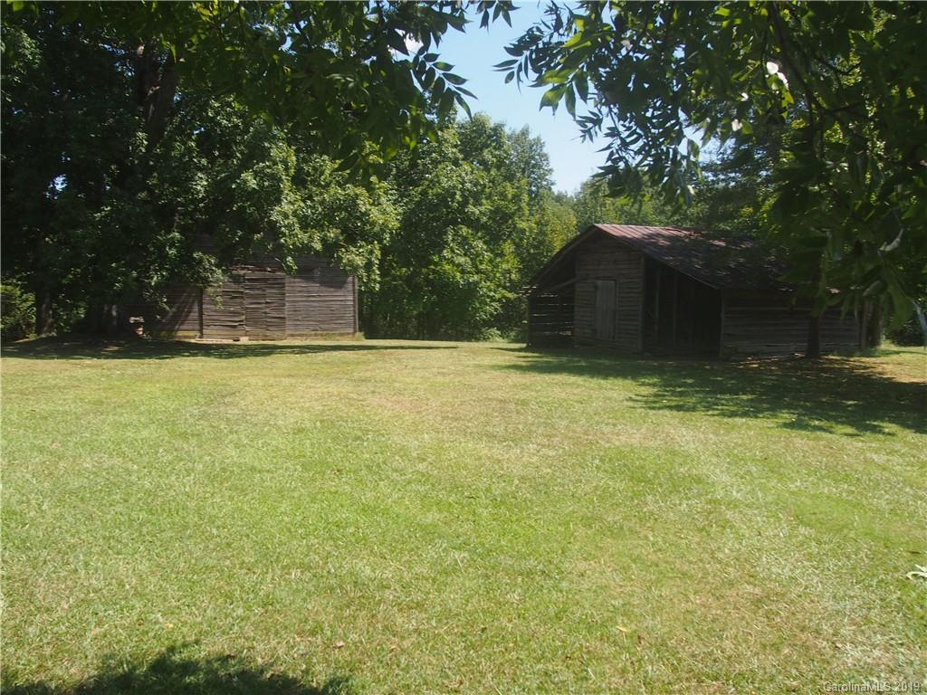 2603 High Ridge Church Road Marshville, NC 28103 - Photo 6 of 16 a view of a house with a yard