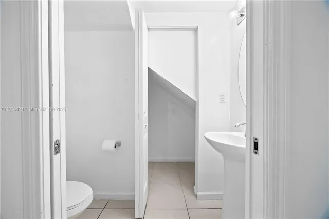 a bathroom with a sink and a toilet