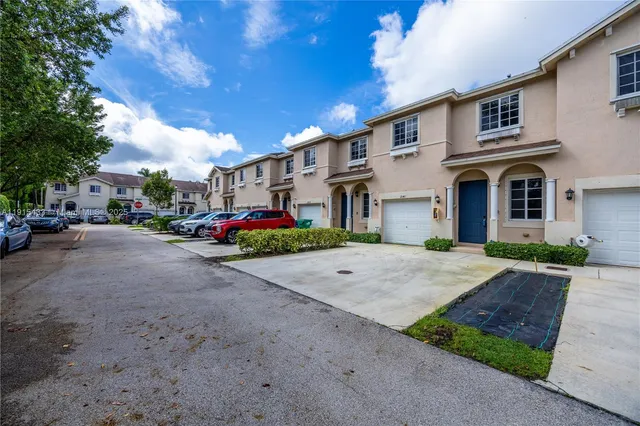 a street view with building and car parked