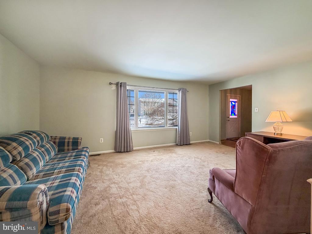 304 Barnsbury Road Langhorne, PA 19047 - Photo 7 of 55 a living room with furniture and window