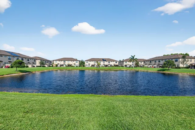 a view of a lake with a city