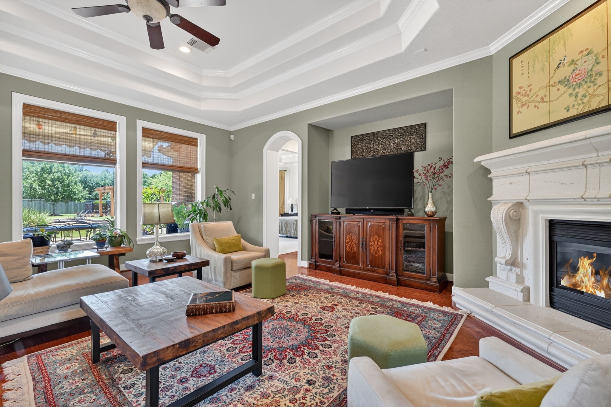 15 White Meadow Court Spring, TX 77379 - Photo 6 of 48 Bright den with triple window views of backyard. Wood floors.