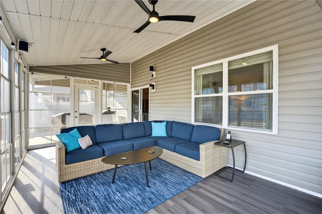 102 Preservation Drive Greer, SC 29650 - Photo 23 of 44 This inviting porch offers an ideal space for relaxation and enjoyment.
