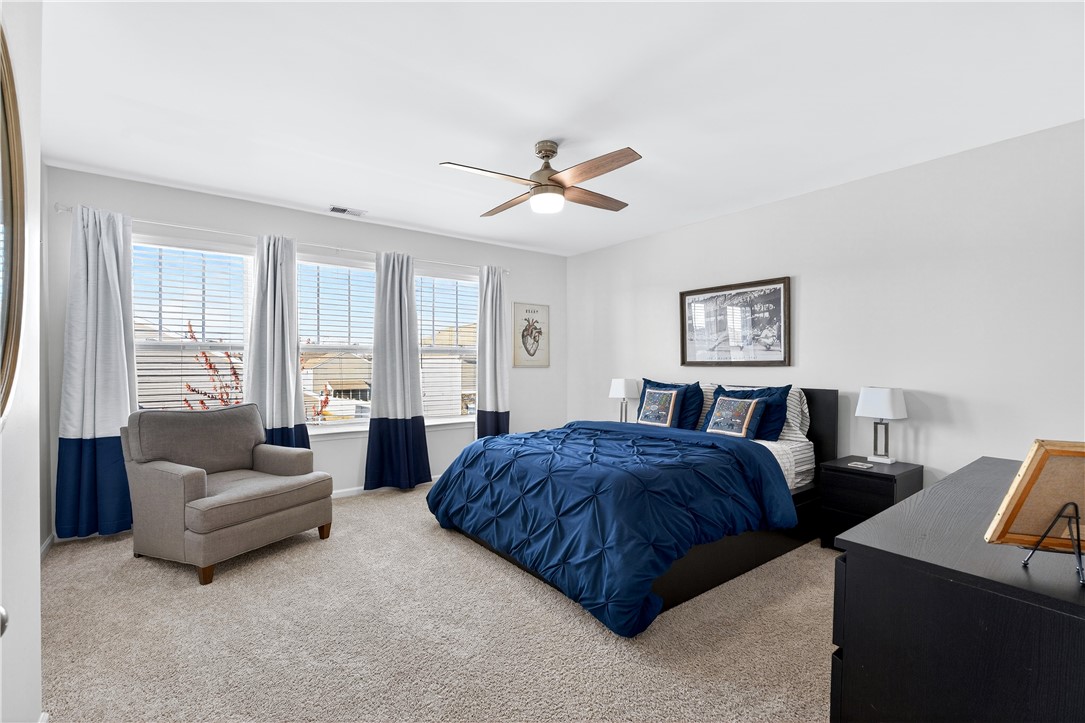 102 Preservation Drive Greer, SC 29650 - Photo 30 of 44 This tranquil bedroom offers comfort and a peaceful retreat for relaxation.