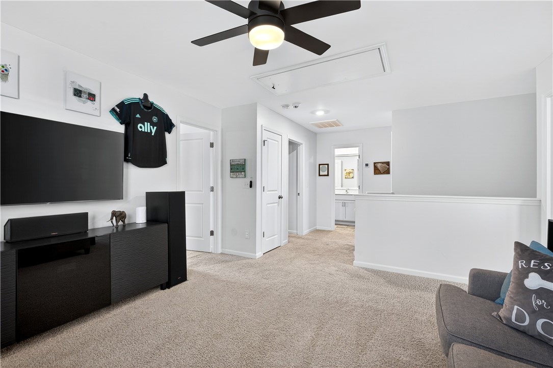 102 Preservation Drive Greer, SC 29650 - Photo 33 of 44 This versatile loft area offers a flexible space for relaxation or entertainment, complementing any lifestyle.