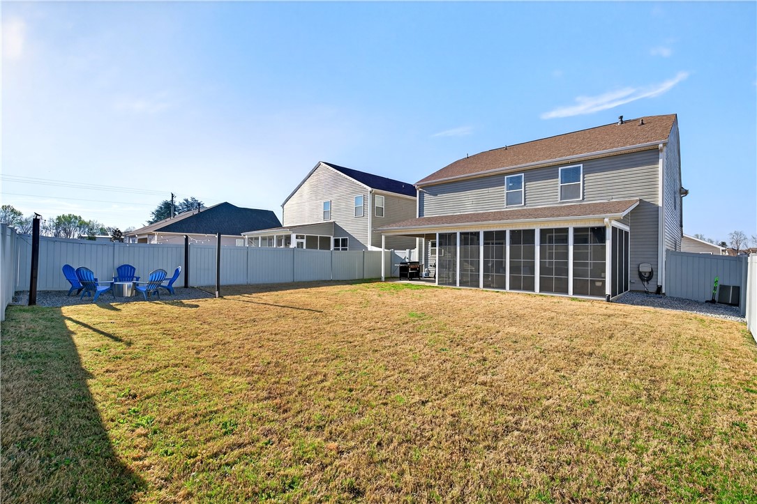 102 Preservation Drive Greer, SC 29650 - Photo 5 of 44 This spacious private yard features a screened patio, perfect for outdoor enjoyment.