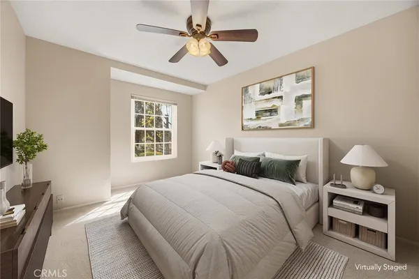 a bathroom with a granite countertop sink toilet tub and shower