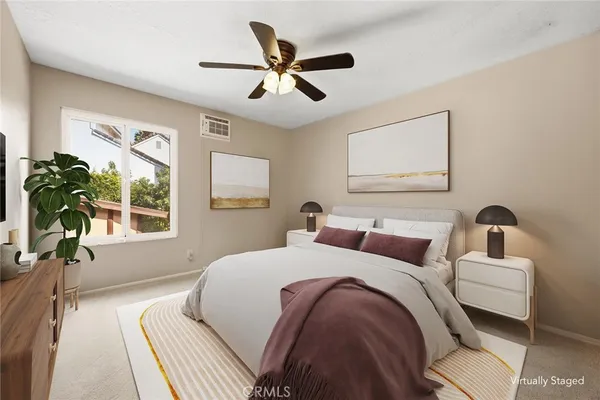 a view of a house with a yard porch and sitting area