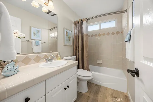 a swimming pool with outdoor seating and yard