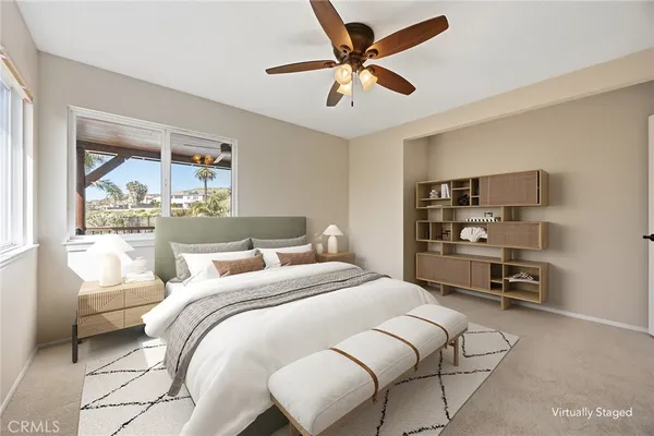 a view of a dining room with furniture wooden floor and a chandelier
