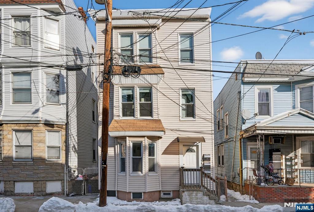 229 Patterson Street Harrison, NJ 07029 - Photo 2 of 25 a front view of a large building