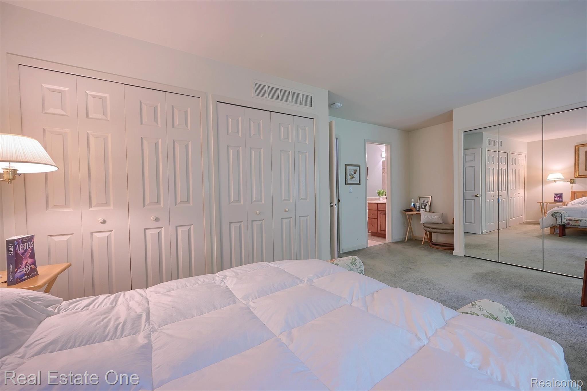 1542 Hidden Valley Lane, Unit 203 Rochester, MI 48306 - Photo 20 of 30 Owner's Bedroom with Private Bath