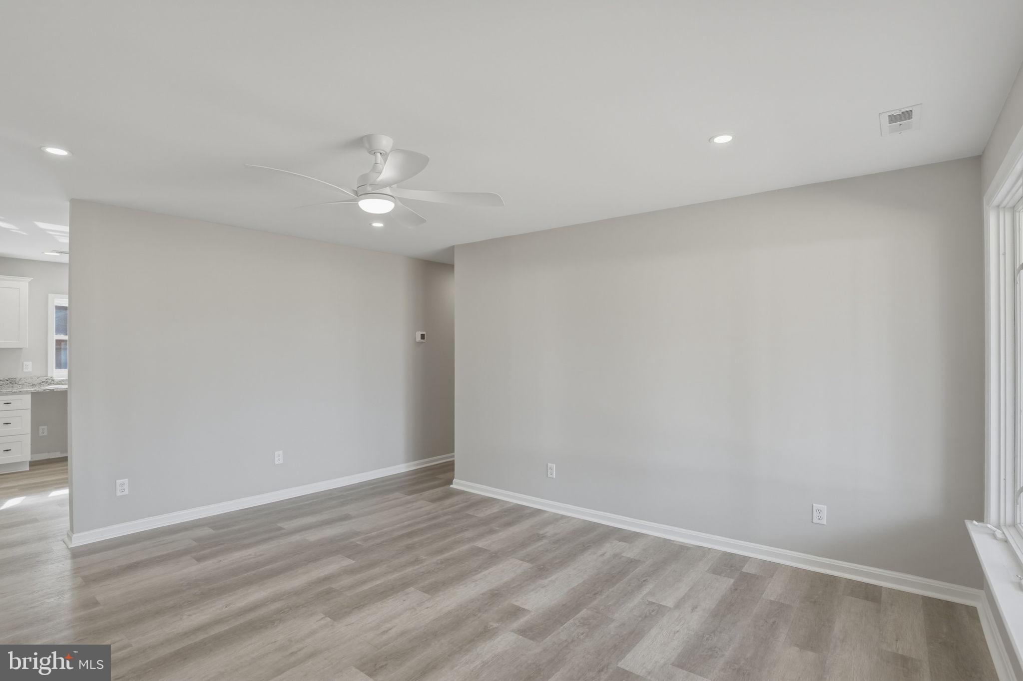 3250 Andrews Lake Road Felton, DE 19943 - Photo 13 of 45 wooden floor in an empty room