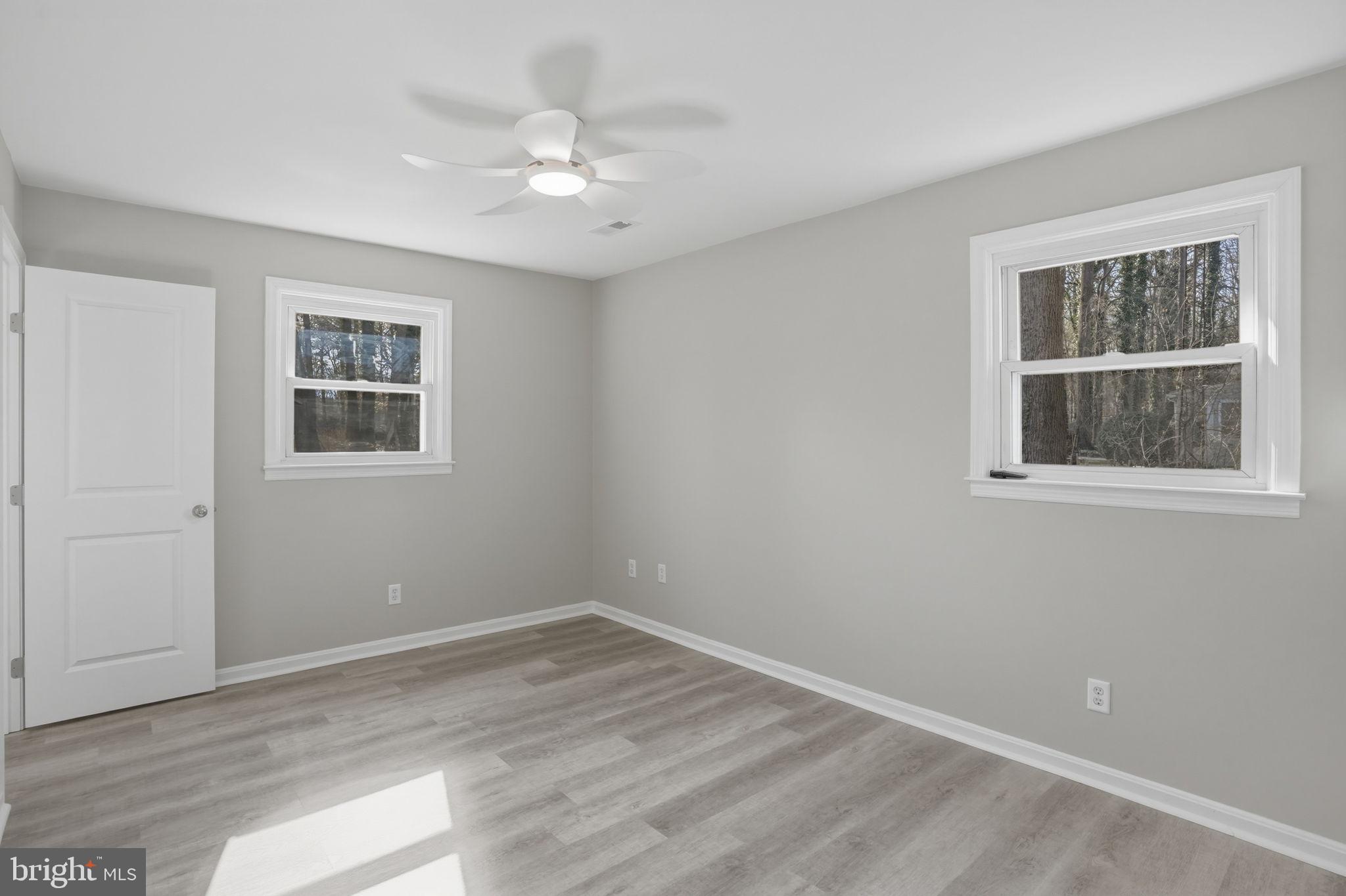 3250 Andrews Lake Road Felton, DE 19943 - Photo 24 of 45 a view of an empty room with a window