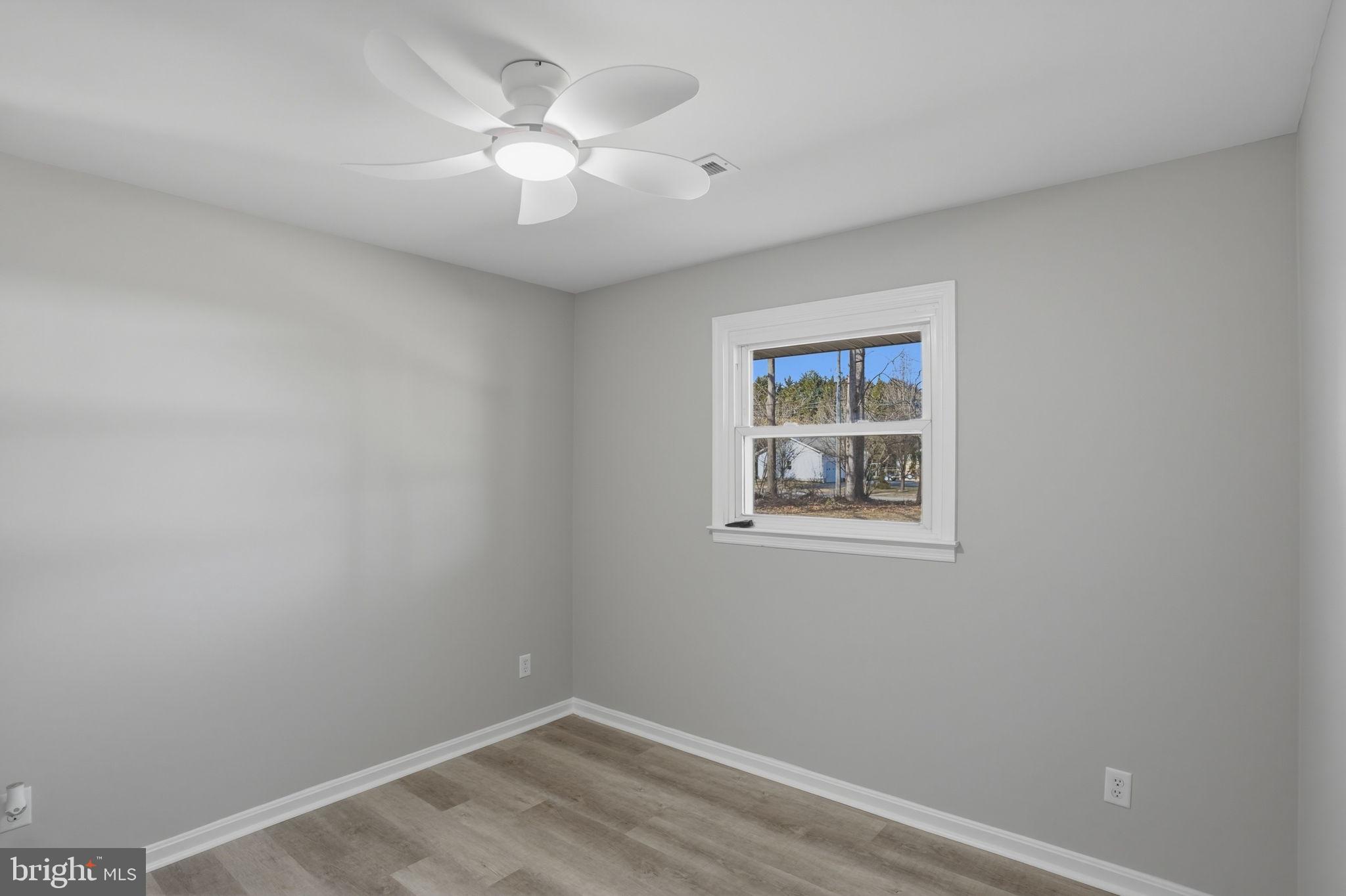 3250 Andrews Lake Road Felton, DE 19943 - Photo 30 of 45 a view of an empty room with a window