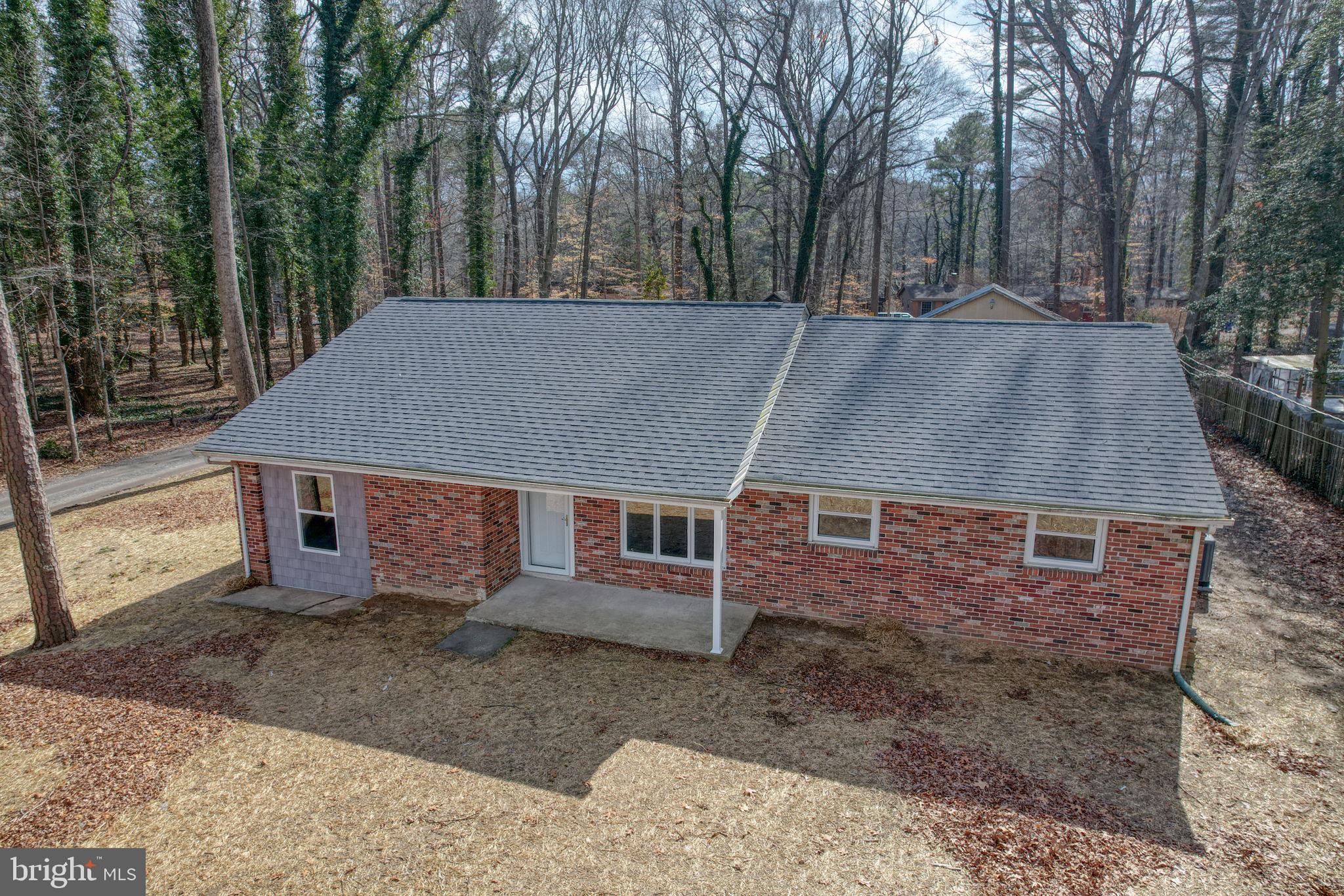 3250 Andrews Lake Road Felton, DE 19943 - Photo 3 of 45 front view of a house with a yard
