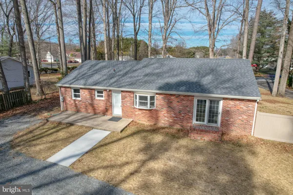 front view of house with a yard