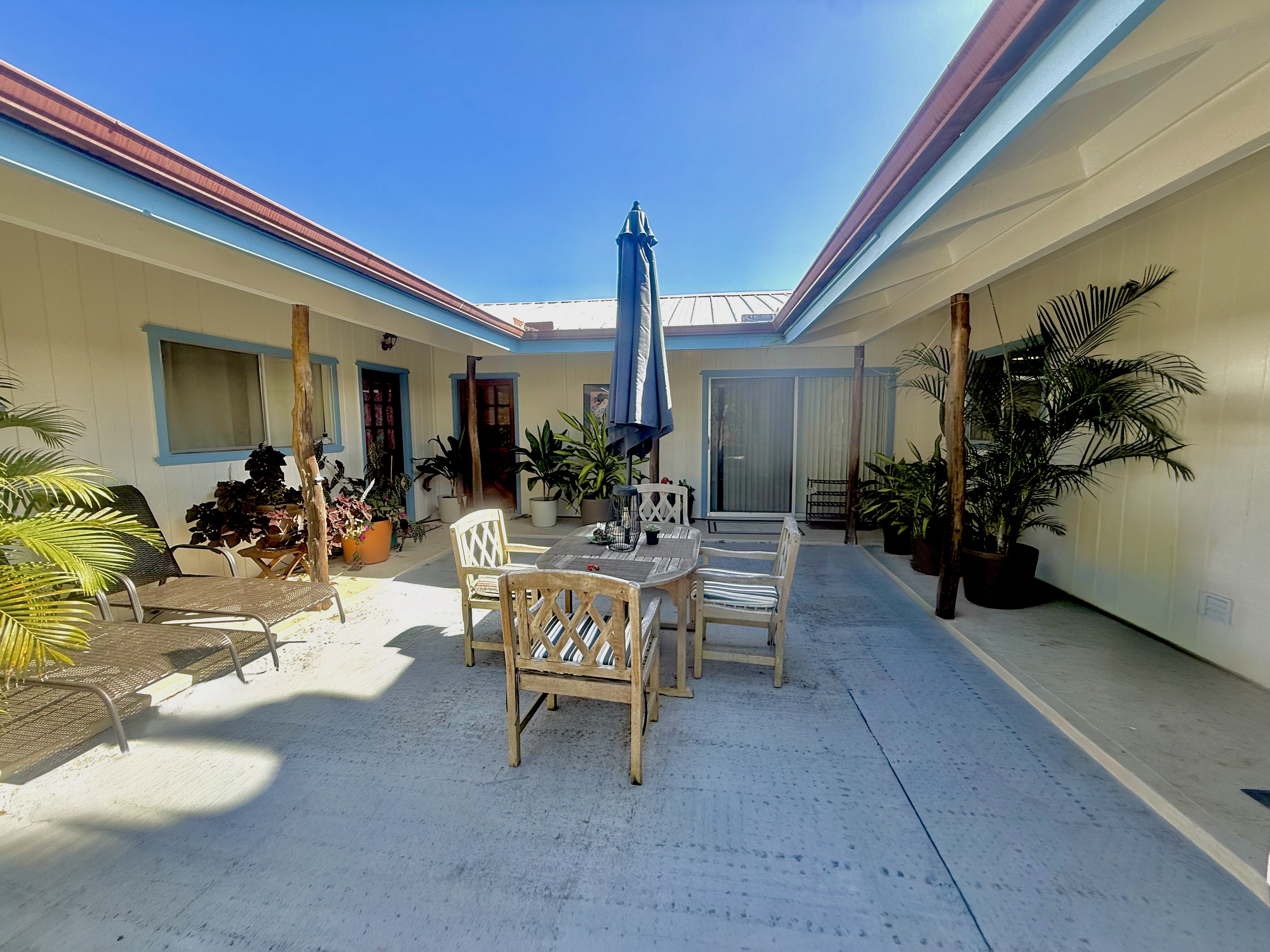 94-1726 Wakea Avenue Naalehu, HI 96772 - Photo 19 of 30 a view of a lobby with furniture and entryway