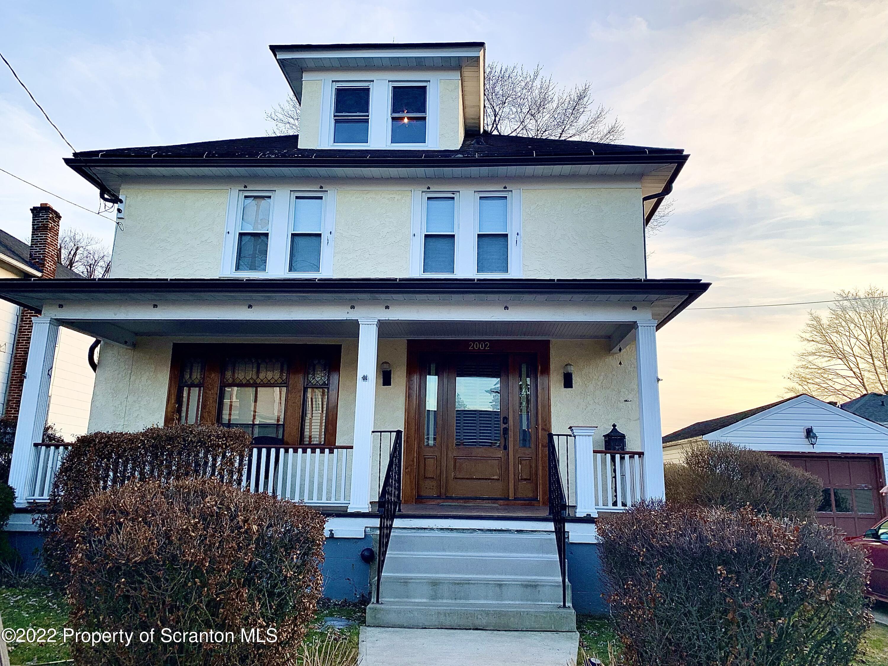 2002 Rigg Street Dunmore, PA 18512 - Photo 1 of 29 a front view of a house