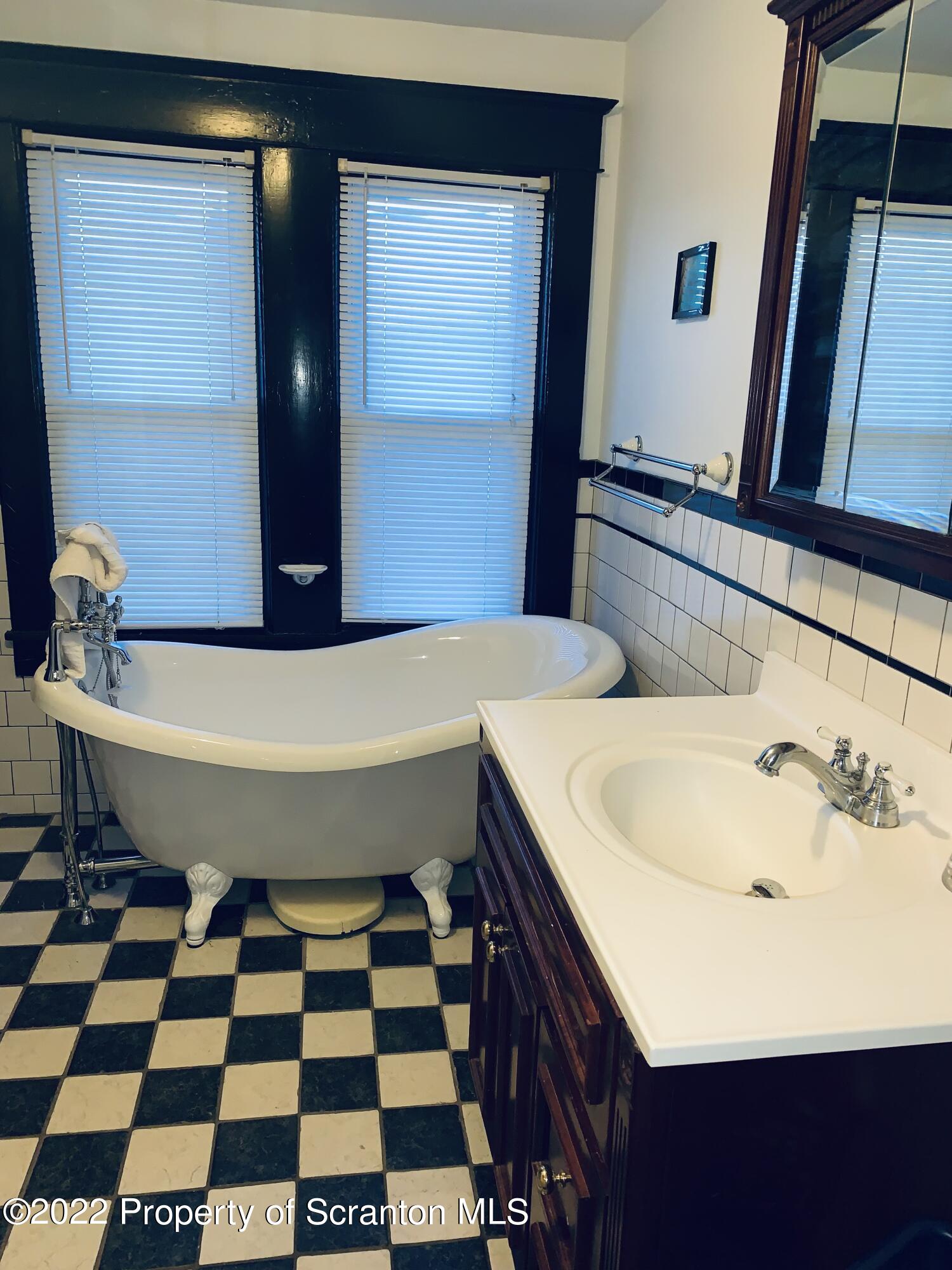 2002 Rigg Street Dunmore, PA 18512 - Photo 20 of 29 a bathroom with a bathtub and a sink