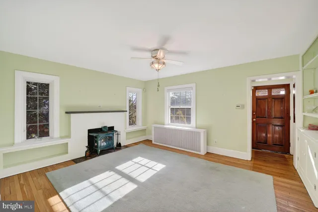 a kitchen with stainless steel appliances a stove a microwave and cabinets