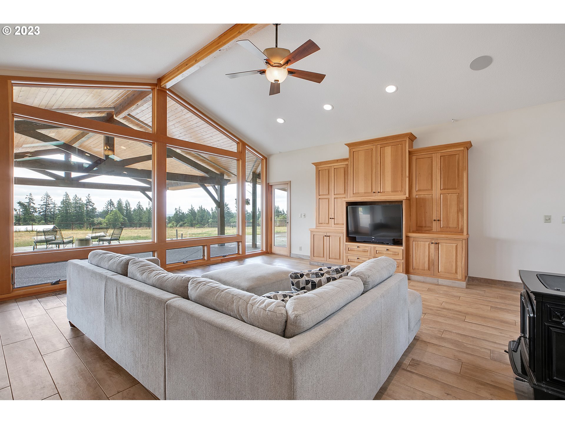14315 Southwest Westfall Road Sherwood, OR 97140 - Photo 12 of 45 a living room with furniture and a flat screen tv