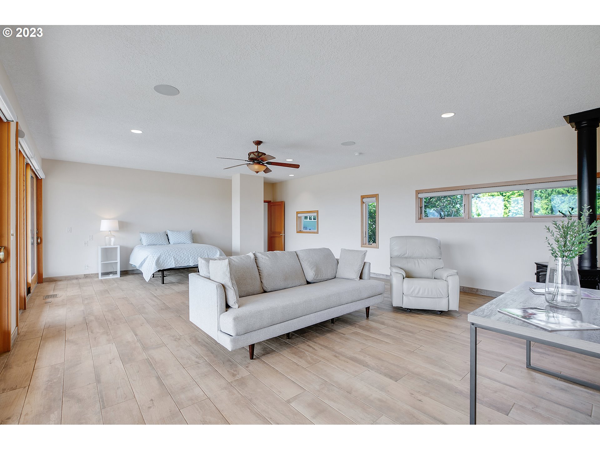 14315 Southwest Westfall Road Sherwood, OR 97140 - Photo 20 of 45 a living room with furniture and a wooden floor