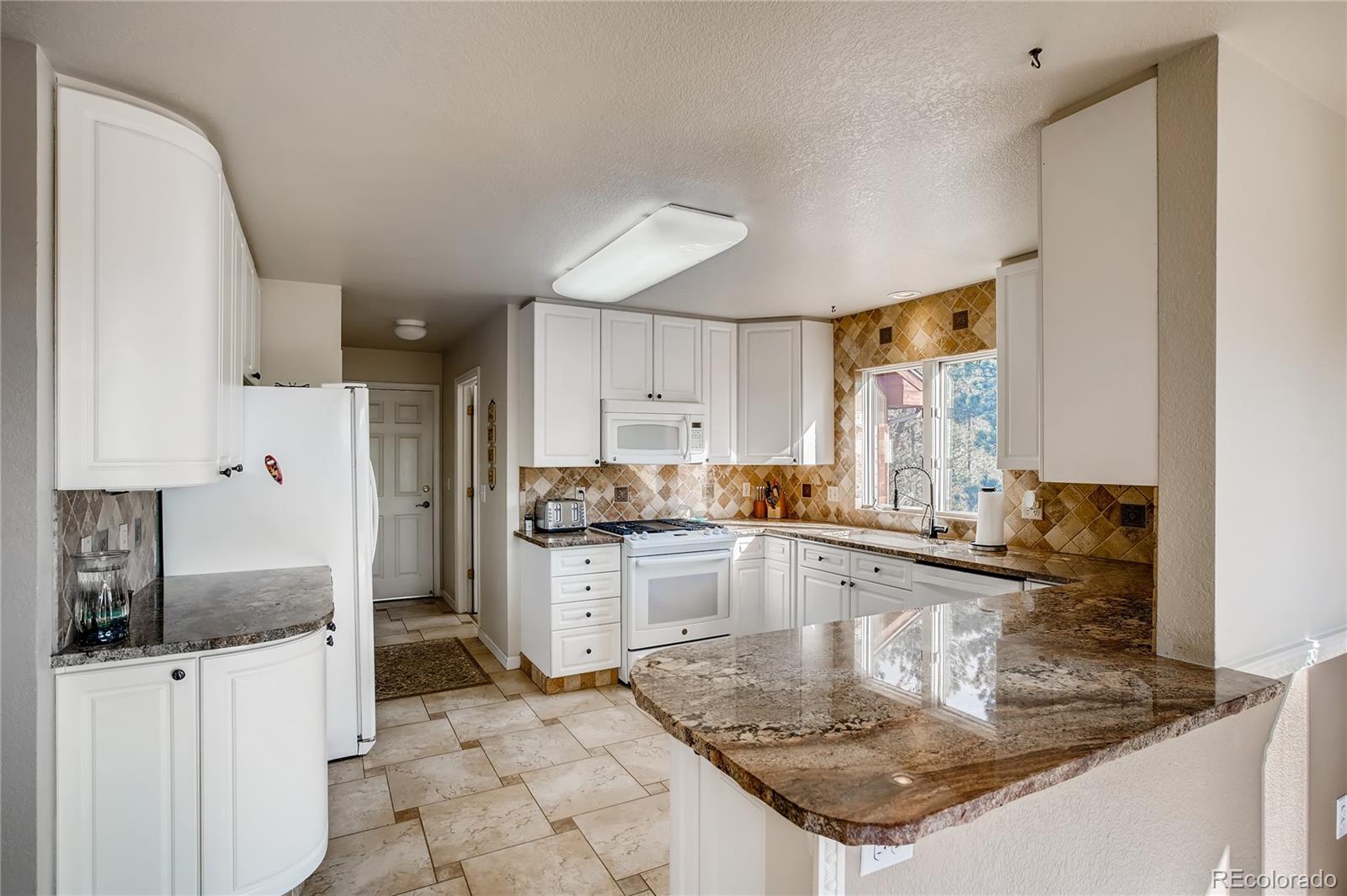 330 Holmes Gulch Road Bailey, CO 80421 - Photo 9 of 40 Gallery Image 9