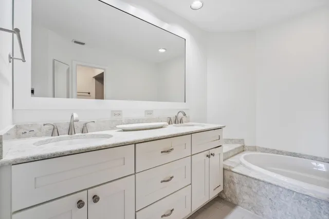 a bathroom with a shower toilet and sink