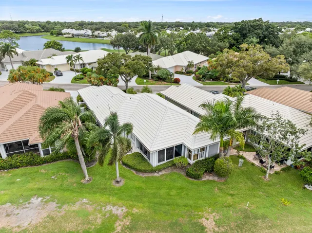 an aerial view of a house with outdoor space