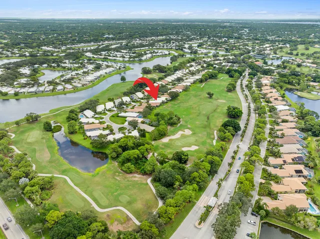 a front view of house with yard and patio