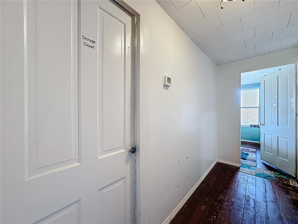 7717 Clarcona Ocoee Road Orlando, FL 32818 - Photo 27 of 63 a view of a closet area with living room