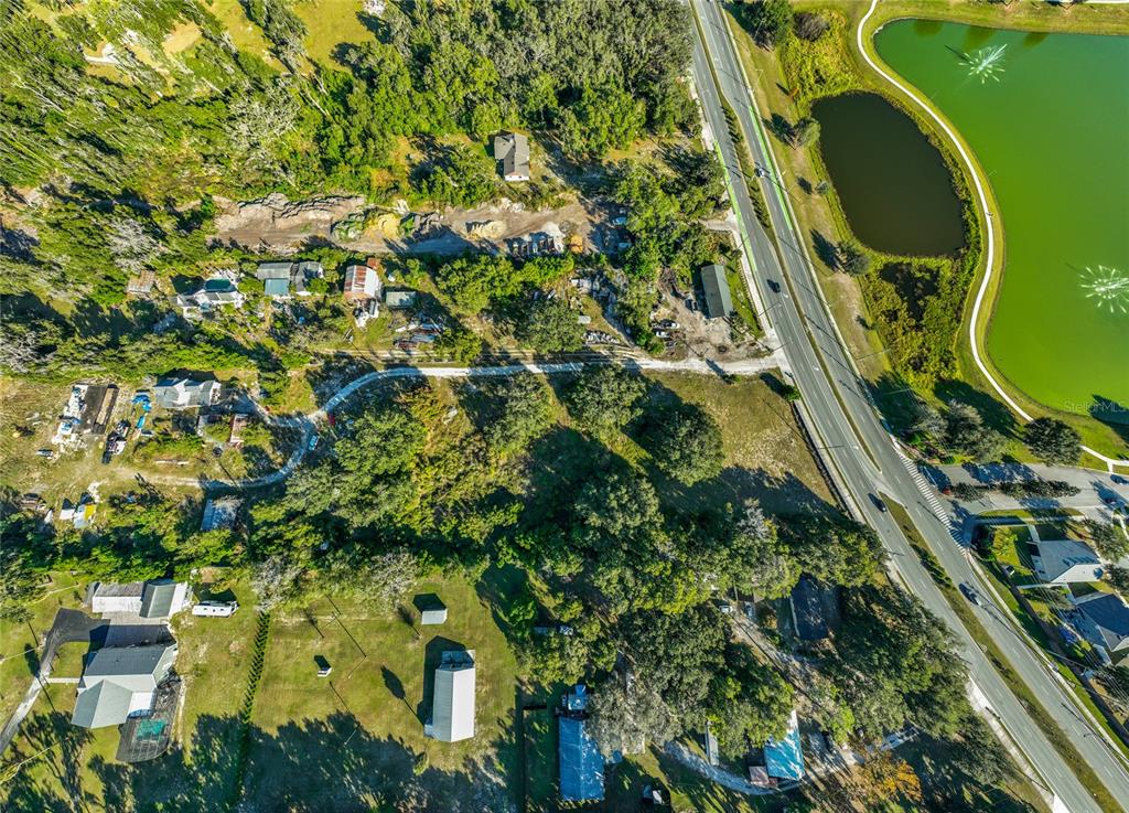 7717 Clarcona Ocoee Road Orlando, FL 32818 - Photo 57 of 63 an aerial view of residential houses with outdoor space