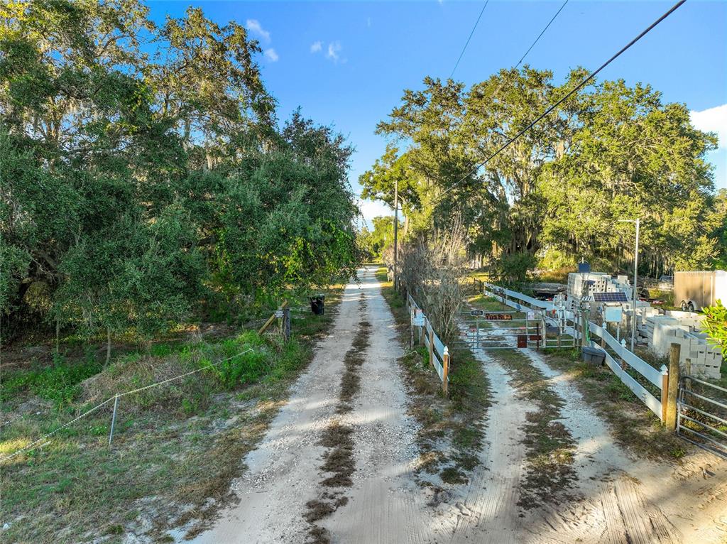 7717 Clarcona Ocoee Road Orlando, FL 32818 - Photo 63 of 63 a view of a water pond with green space