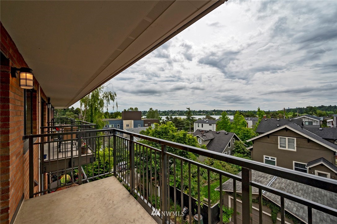 911 North 73rd Street, Unit 407 Seattle, WA 98103 - Photo 12 of 27 a view of a balcony with an outdoor space